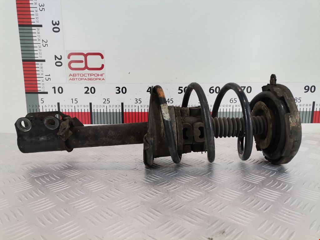 Стойка амортизатора переднего левого Renault Scenic 1 (1996-2003)