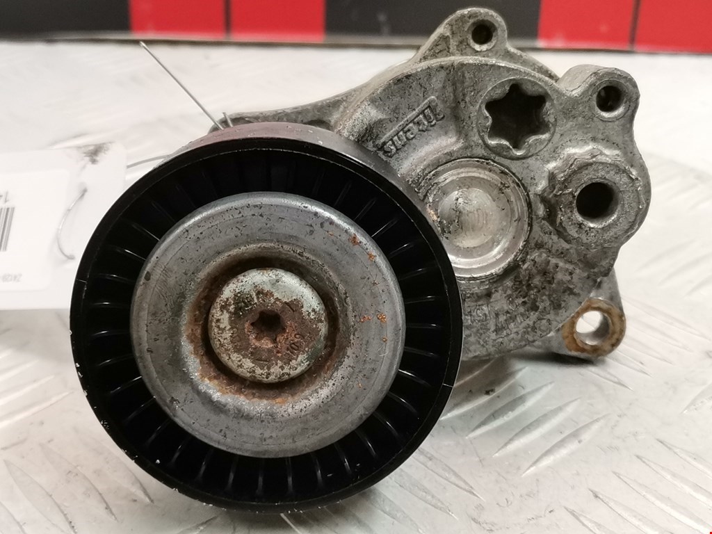 Натяжитель ремня генератора (приводного поликлинового ремня Mercedes C-Class (W202) (1993-2001)