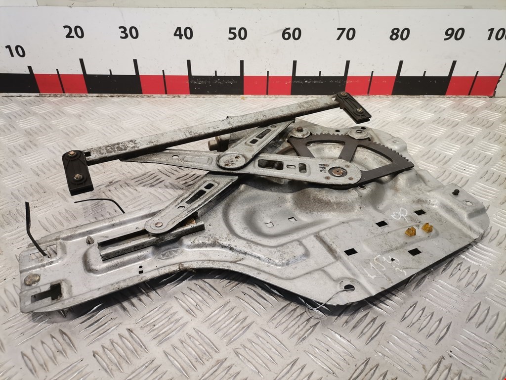 Стеклоподъемник задний левый KIA Cerato I 2004-2009