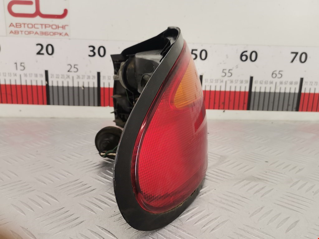 Фонарь задний левый MAZDA 323 BA 1994-1998