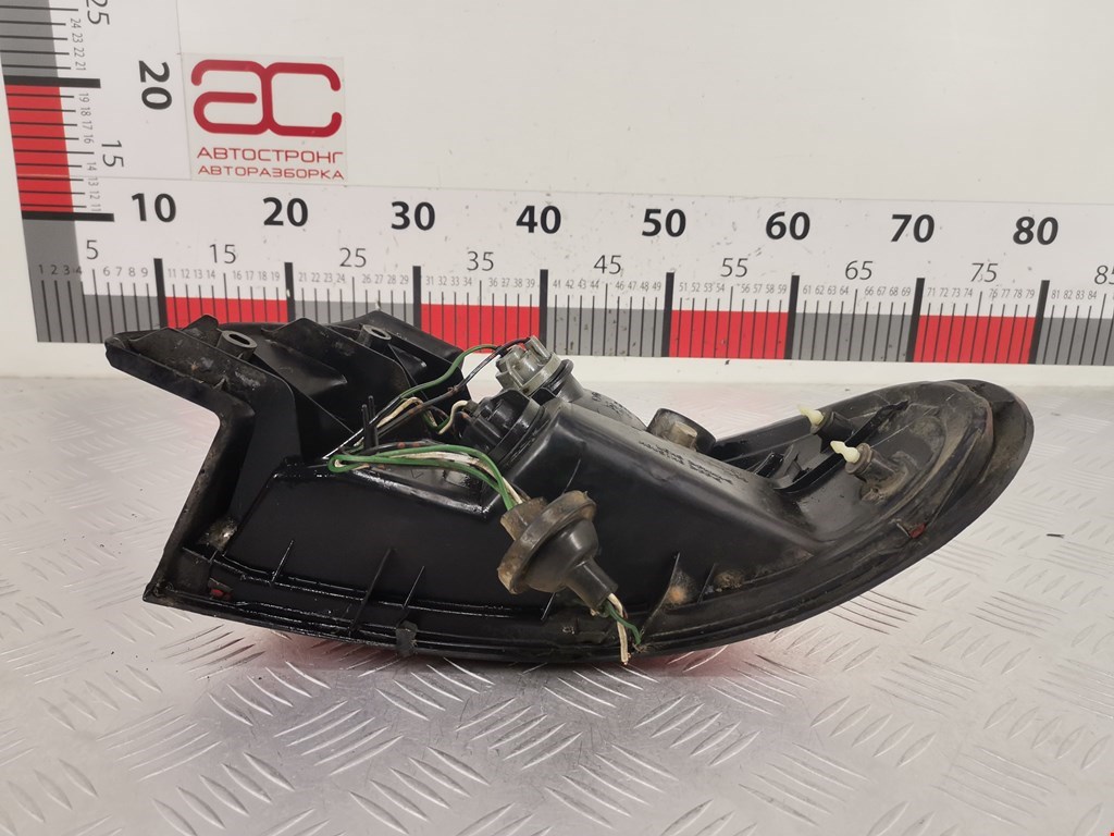 Фонарь задний левый MAZDA 323 BA 1994-1998