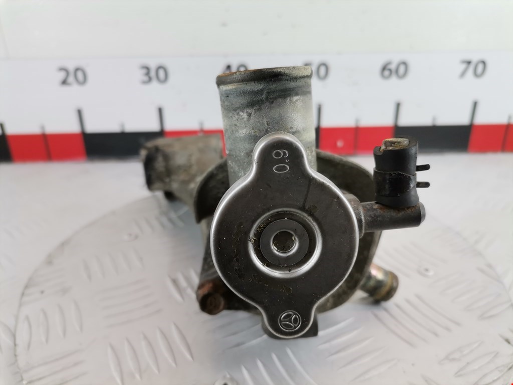 Корпус термостата KIA Carnival I 1999-2005