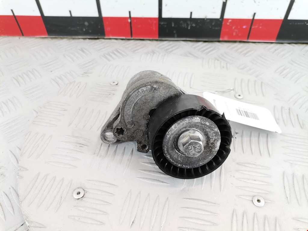 Натяжитель ремня генератора (приводного поликлинового ремня Renault Laguna 3 (2007-2010)