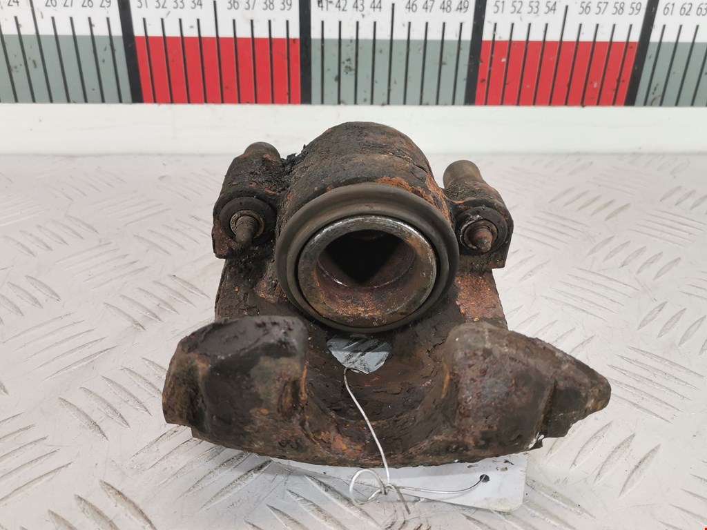 Суппорт передний левый VOLKSWAGEN Polo III 1994-2001