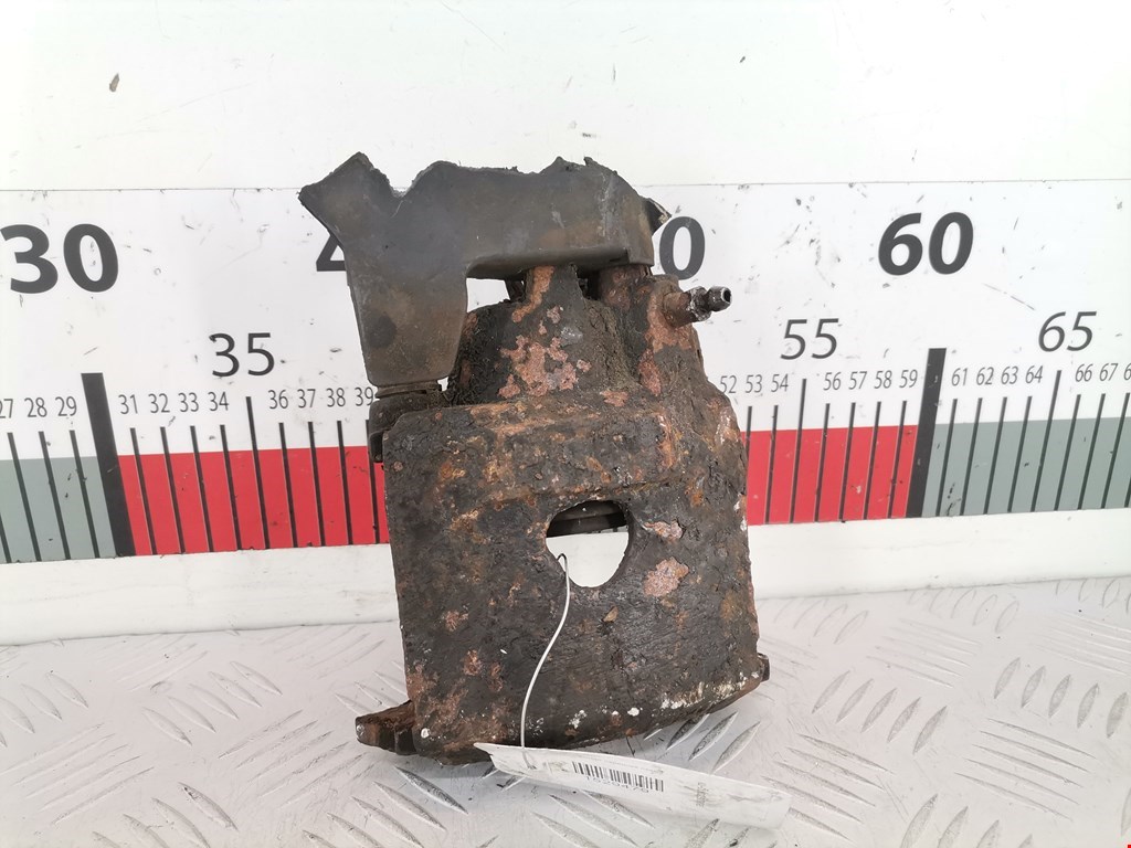 Суппорт передний левый VOLKSWAGEN Polo III 1994-2001