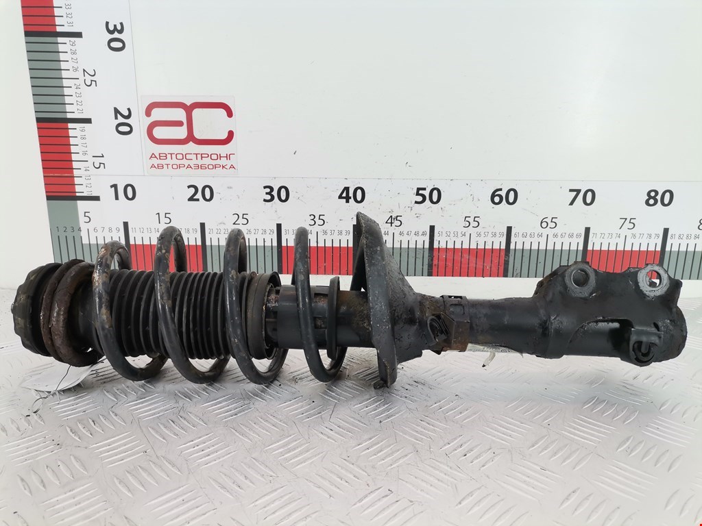 Стойка амортизатора переднего левого Volkswagen Polo 3 (1994-2002)