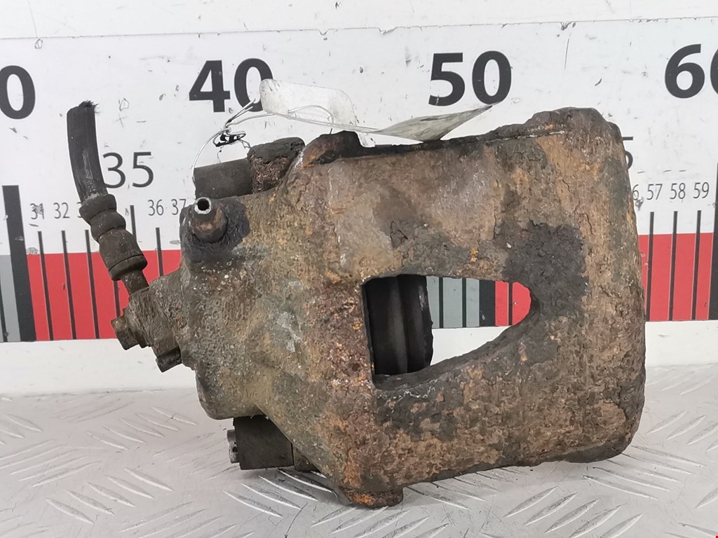 Суппорт передний левый VOLKSWAGEN Polo IV 2001-2009