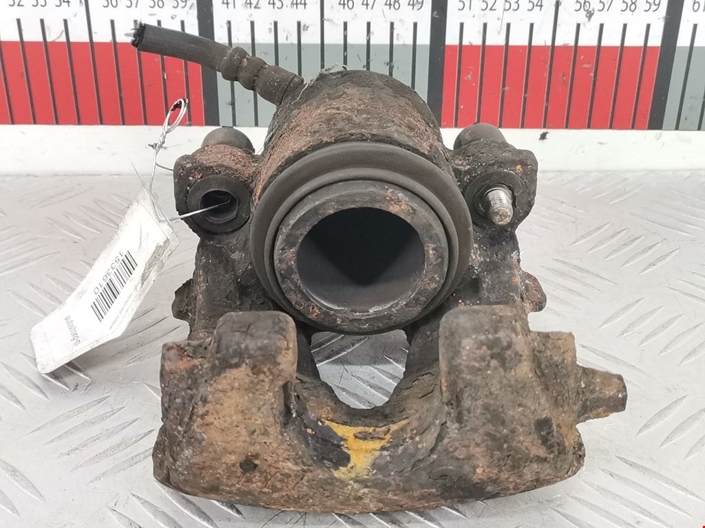 Суппорт передний левый VOLKSWAGEN Polo IV 2001-2009