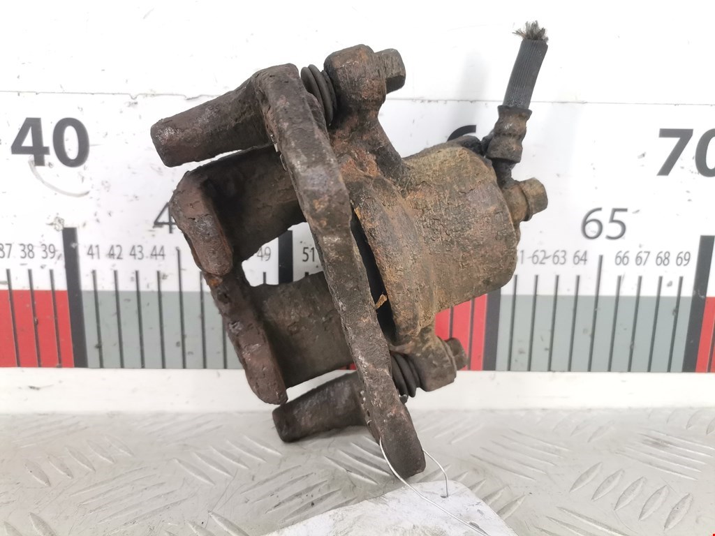 Суппорт передний правый DAIHATSU Cuore Cuore L251 2003-2007