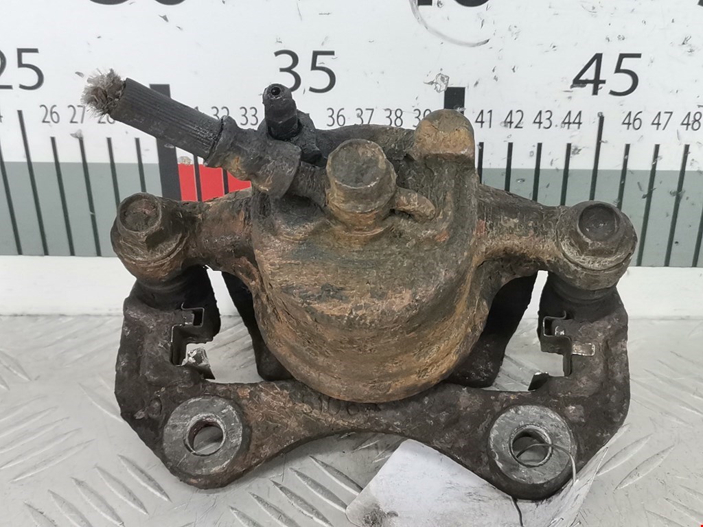 Суппорт передний правый DAIHATSU Cuore Cuore L251 2003-2007