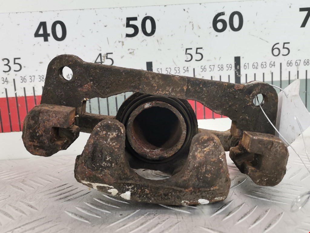 Суппорт передний левый CHEVROLET Spark 2005-2010