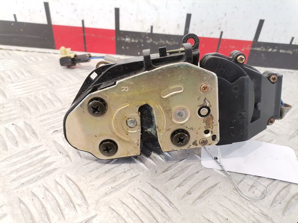 Замок двери передней правой KIA Carens 1999-2002