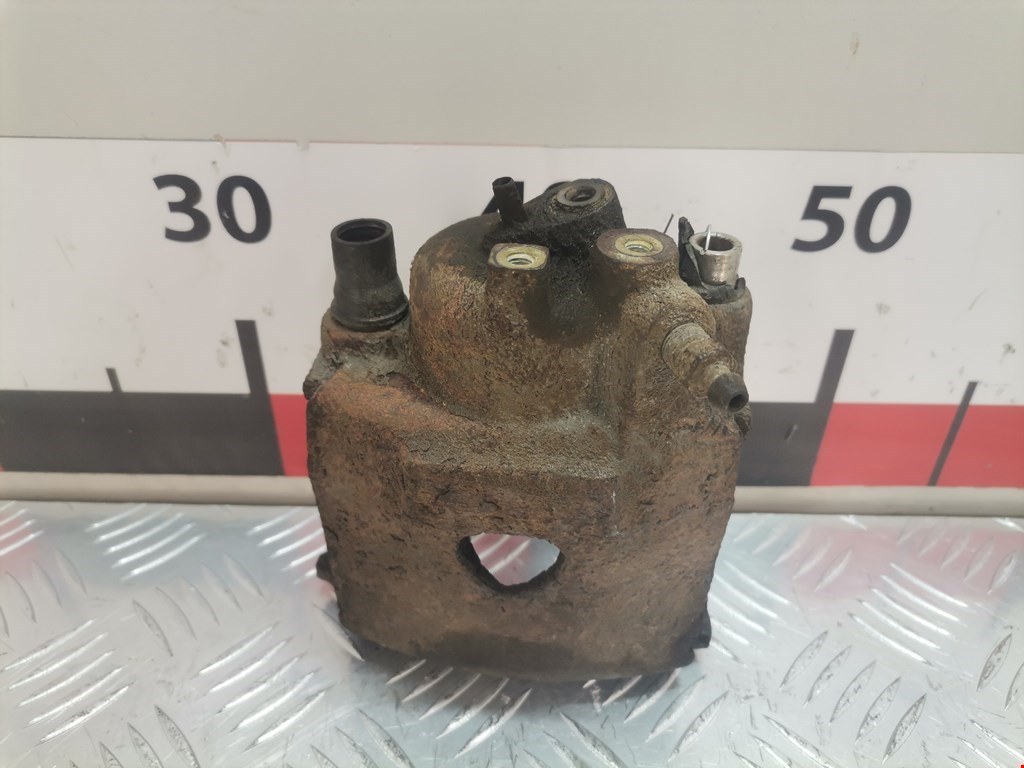 Суппорт передний левый VOLKSWAGEN Polo III 1994-2001