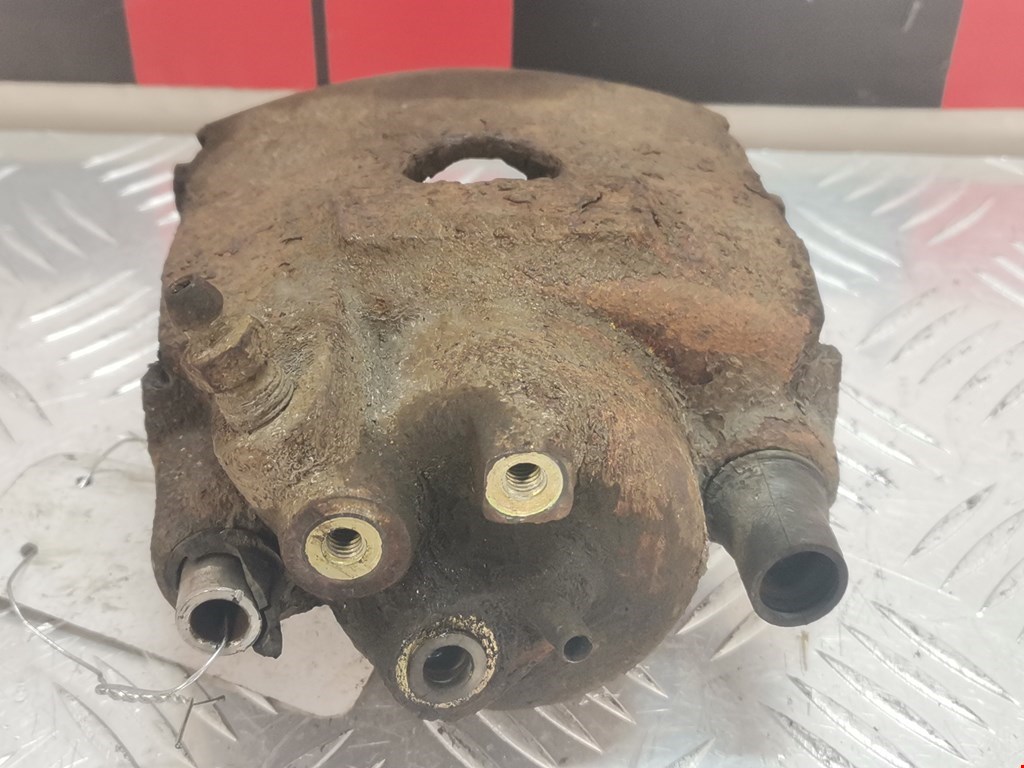 Суппорт передний левый VOLKSWAGEN Polo III 1994-2001