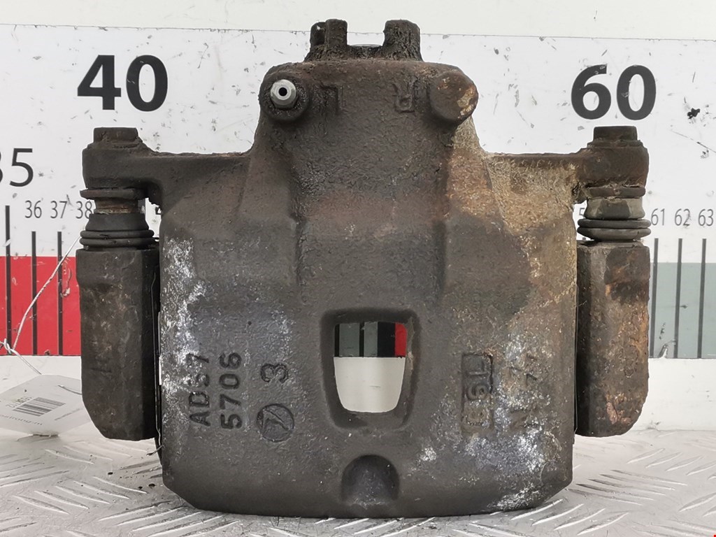 Суппорт передний левый Subaru Legacy 3 (BE/BH) (1998-2004)