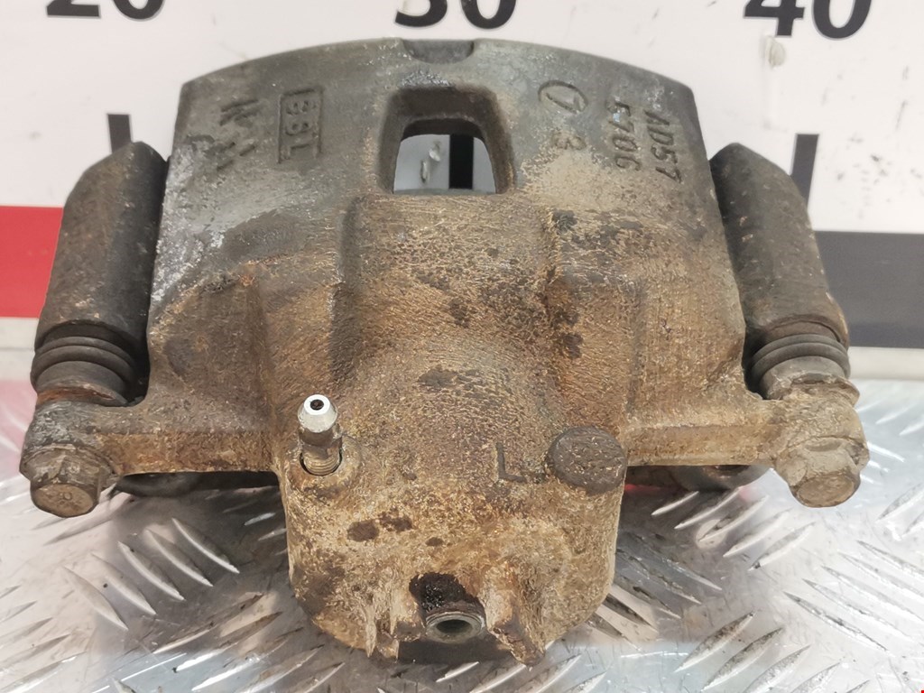 Суппорт передний правый SUBARU Legacy 1998-2004