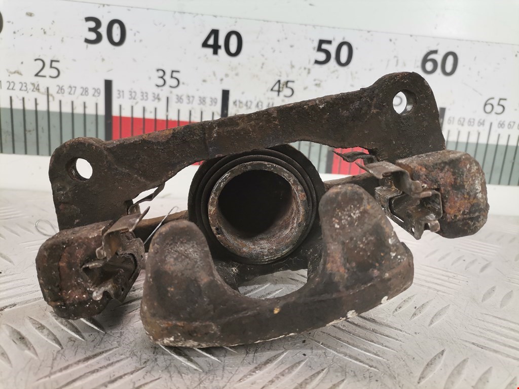 Суппорт передний правый CHEVROLET Spark 2005-2010