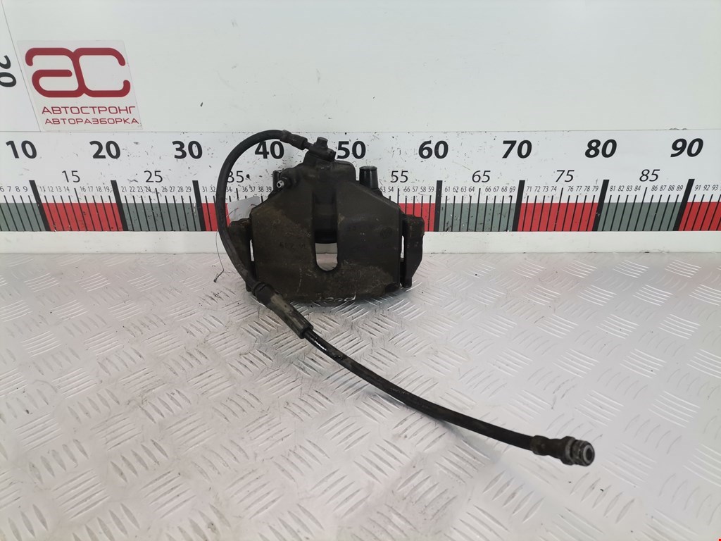 Суппорт передний правый VOLKSWAGEN Passat B7 2011-2015