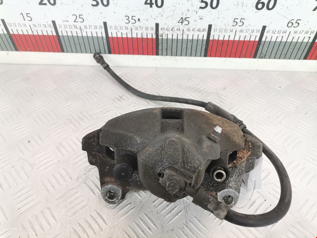 Суппорт передний правый VOLKSWAGEN Passat B7 2011-2015