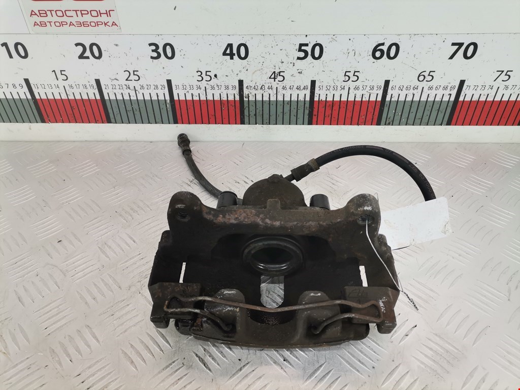 Суппорт передний правый VOLKSWAGEN Passat B7 2011-2015