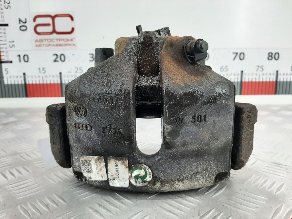 Суппорт передний левый Volkswagen Caddy 3 (2004-2015)