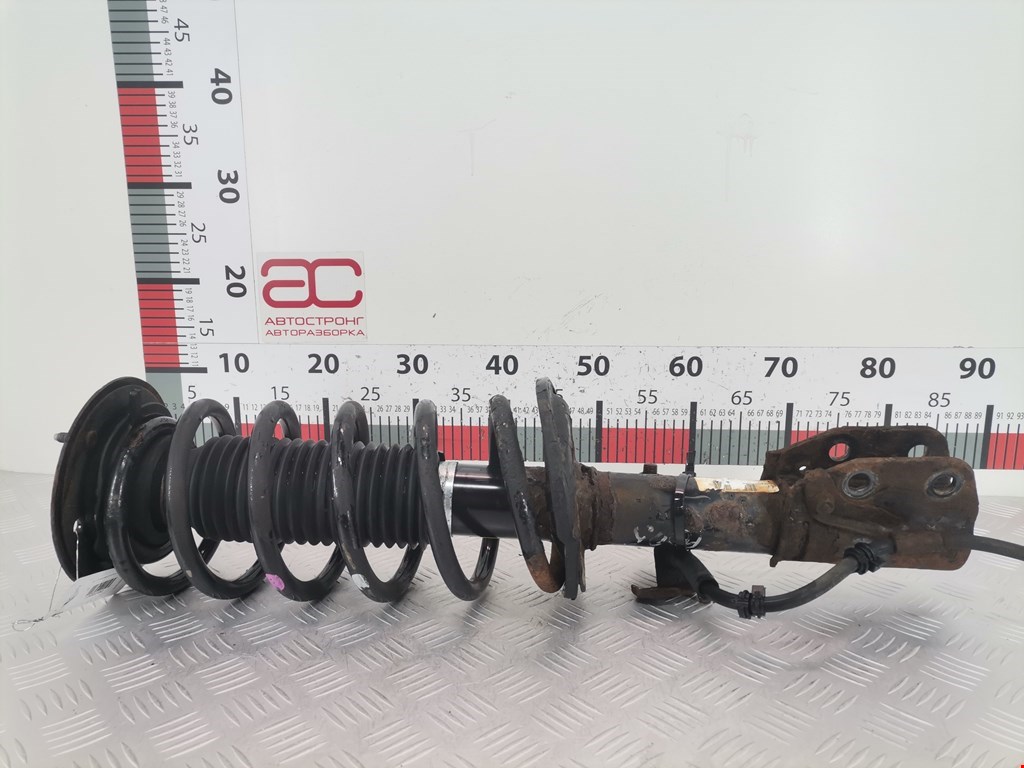 Амортизатор передний левый CHEVROLET Captiva 2006-2010