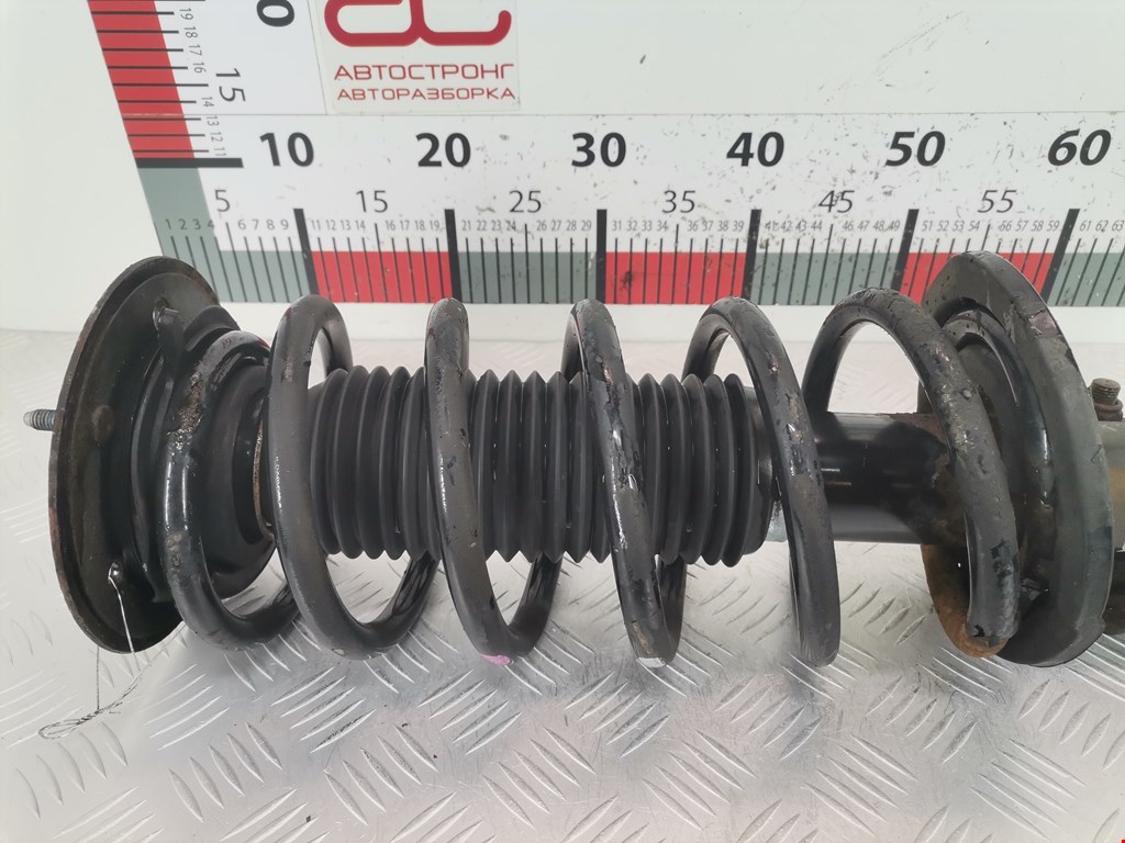 Амортизатор передний левый CHEVROLET Captiva 2006-2010