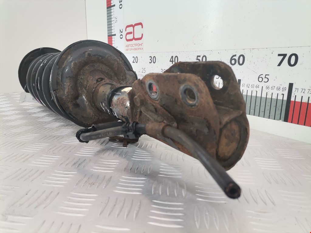 Амортизатор передний левый CHEVROLET Captiva 2006-2010