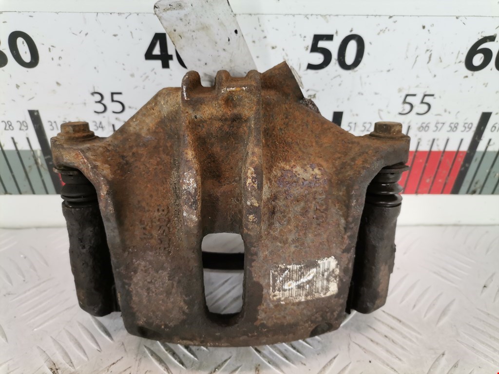 Суппорт передний левый PEUGEOT Partner 1996-2009