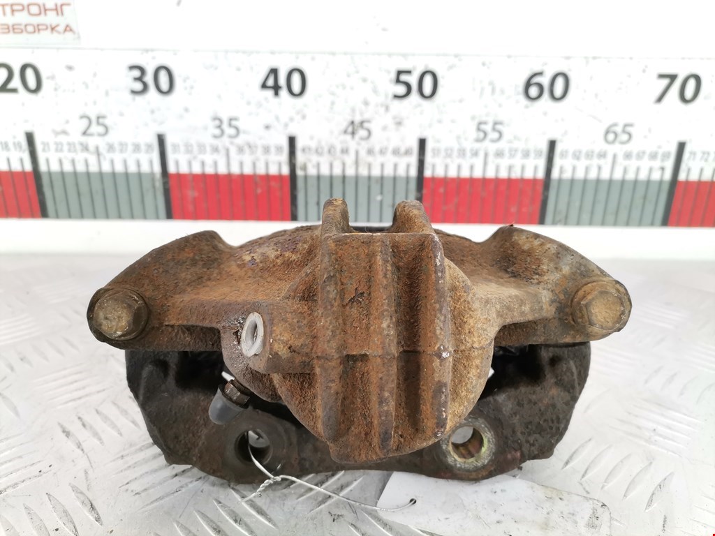 Суппорт передний левый PEUGEOT Partner 1996-2009