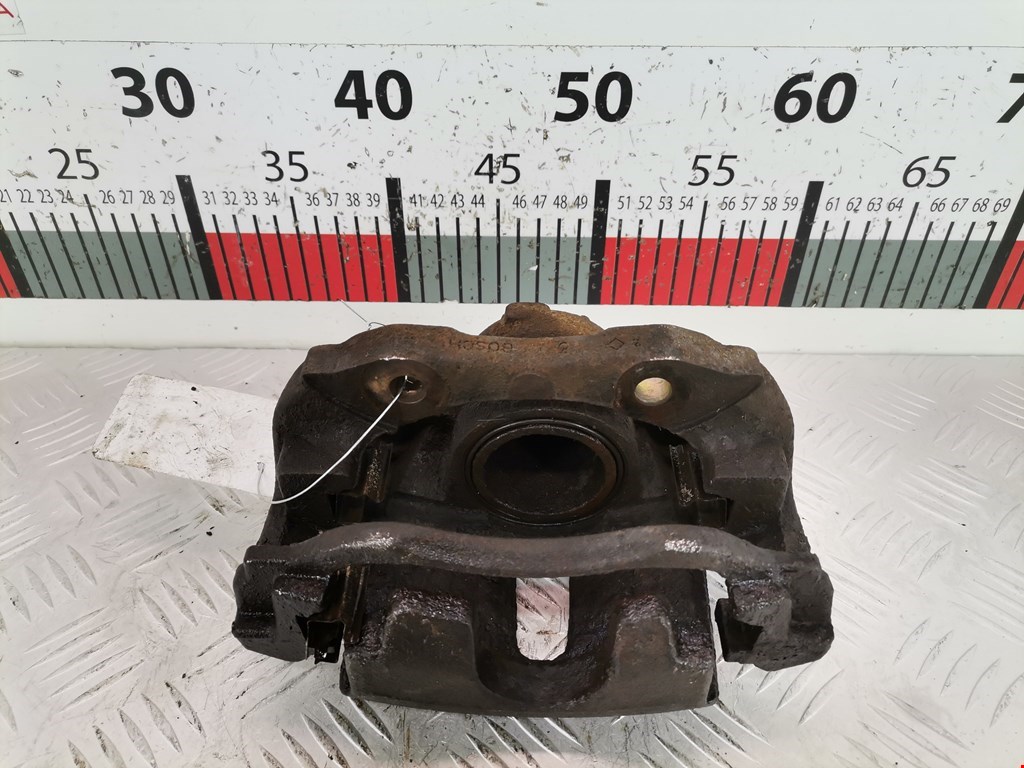 Суппорт передний левый PEUGEOT Partner 1996-2009