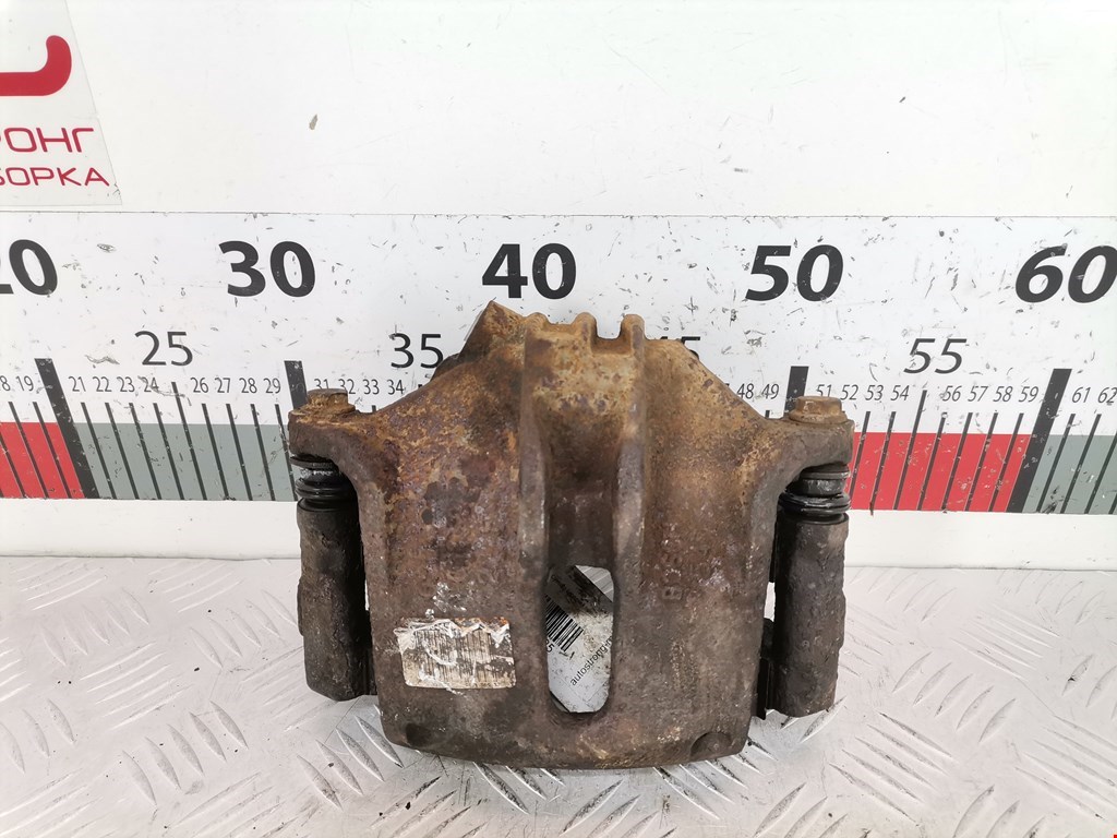 Суппорт передний левый PEUGEOT Partner 1996-2009