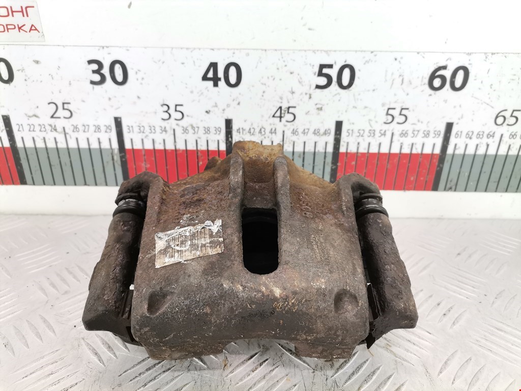 Суппорт передний левый PEUGEOT Partner 1996-2009