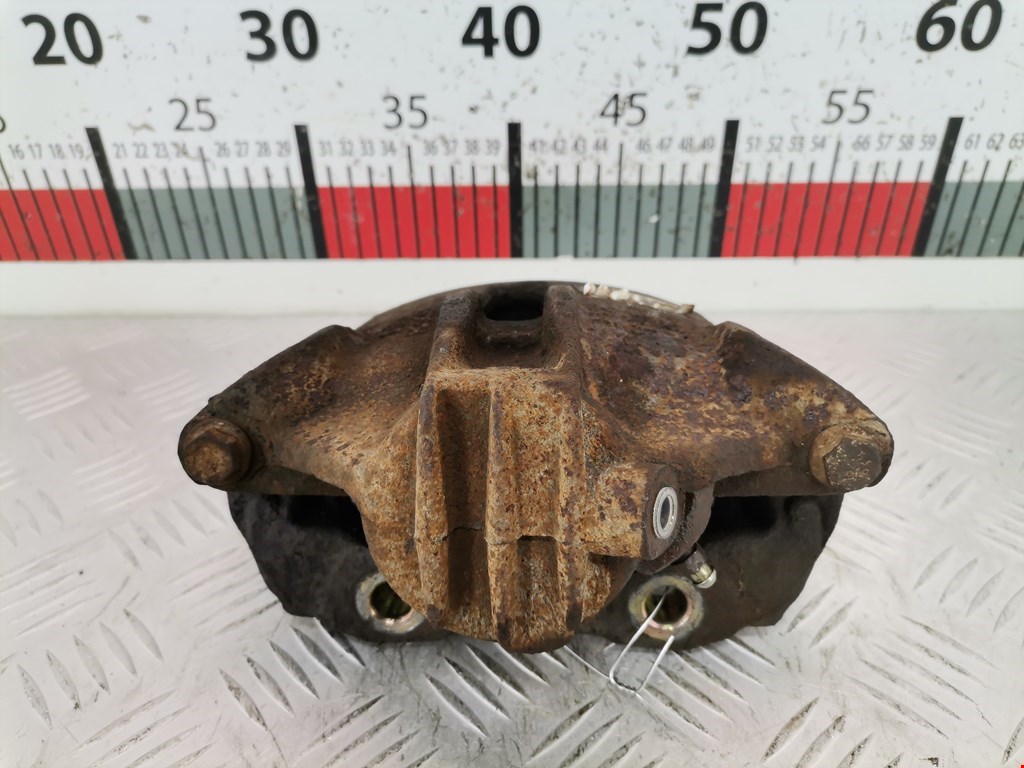 Суппорт передний левый PEUGEOT Partner 1996-2009