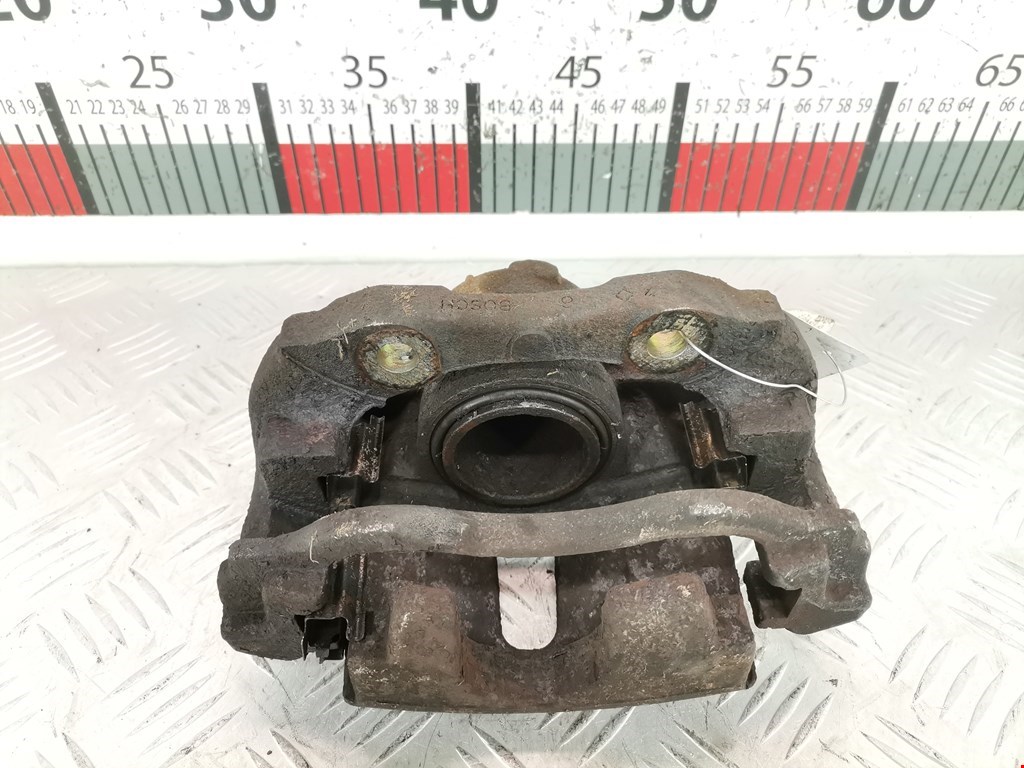 Суппорт передний левый PEUGEOT Partner 1996-2009