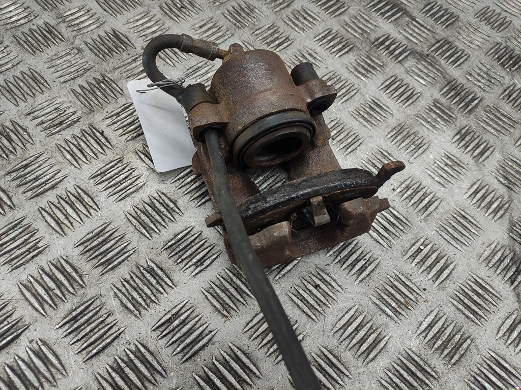 Суппорт передний левый SKODA Octavia A5 1Z- 2004-2013