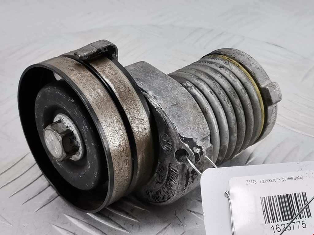 Натяжитель ремня генератора (приводного поликлинового ремня Volkswagen Golf 4 (1997-2004)