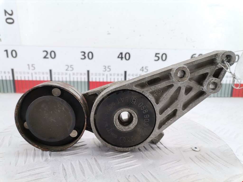 Натяжитель ремня генератора (приводного поликлинового ремня Volkswagen Passat 5 (1996-2000)