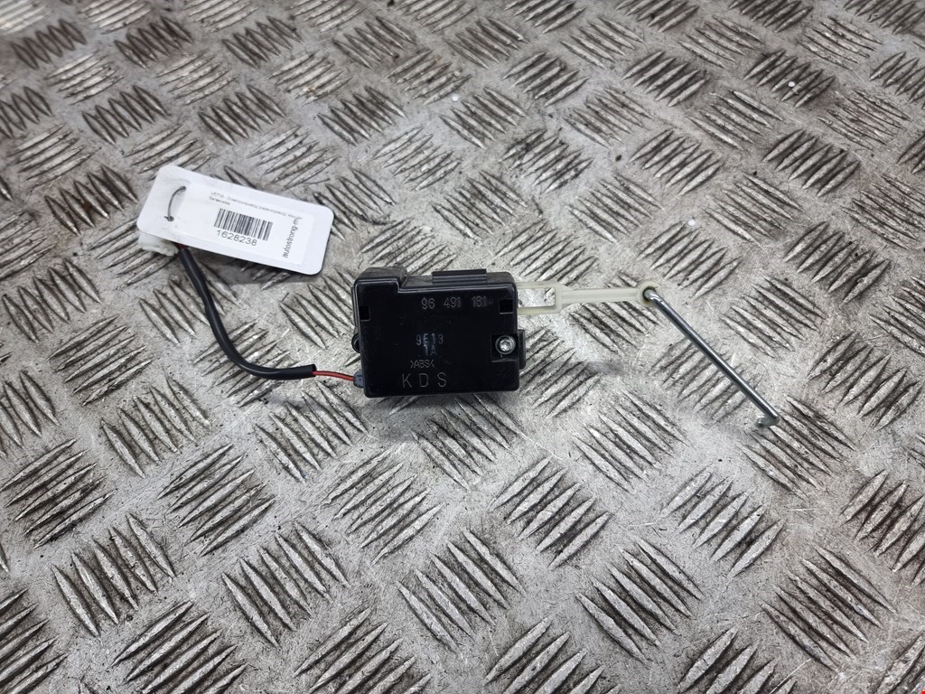 Сервопривод (электропривод моторчик привода) замка крышки багажника Chevrolet Aveo (T200-T250) (2002-2012)