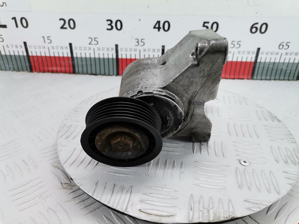 Натяжитель ремня генератора (приводного поликлинового ремня Ford Focus 1 (1998-2005)