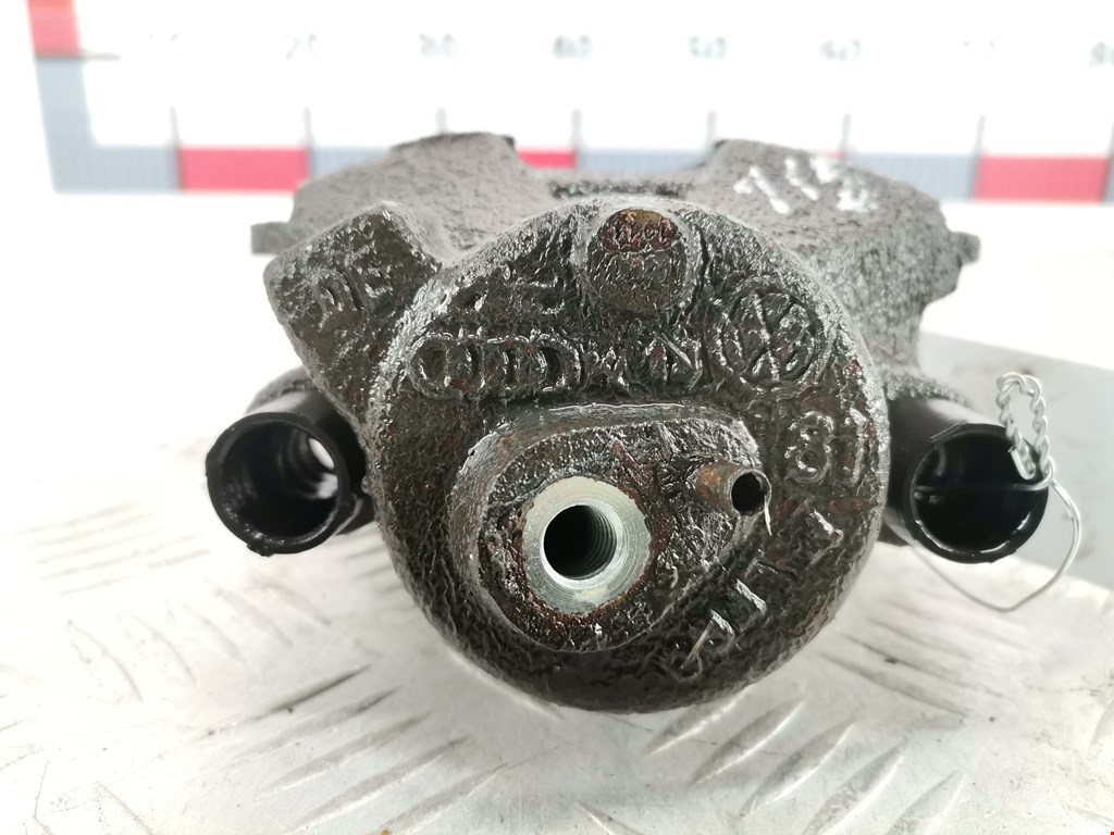 Суппорт передний левый VOLKSWAGEN Polo IV 2001-2009