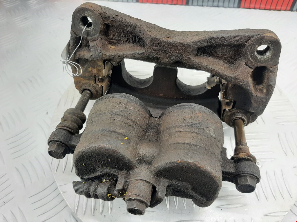 Суппорт передний левый SUBARU Legacy 2009-2014