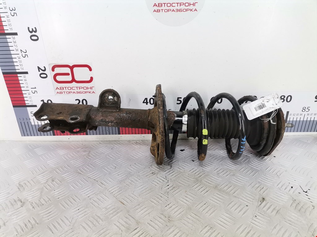 Амортизатор передний левый TOYOTA RAV 4 XA30 2006-2012