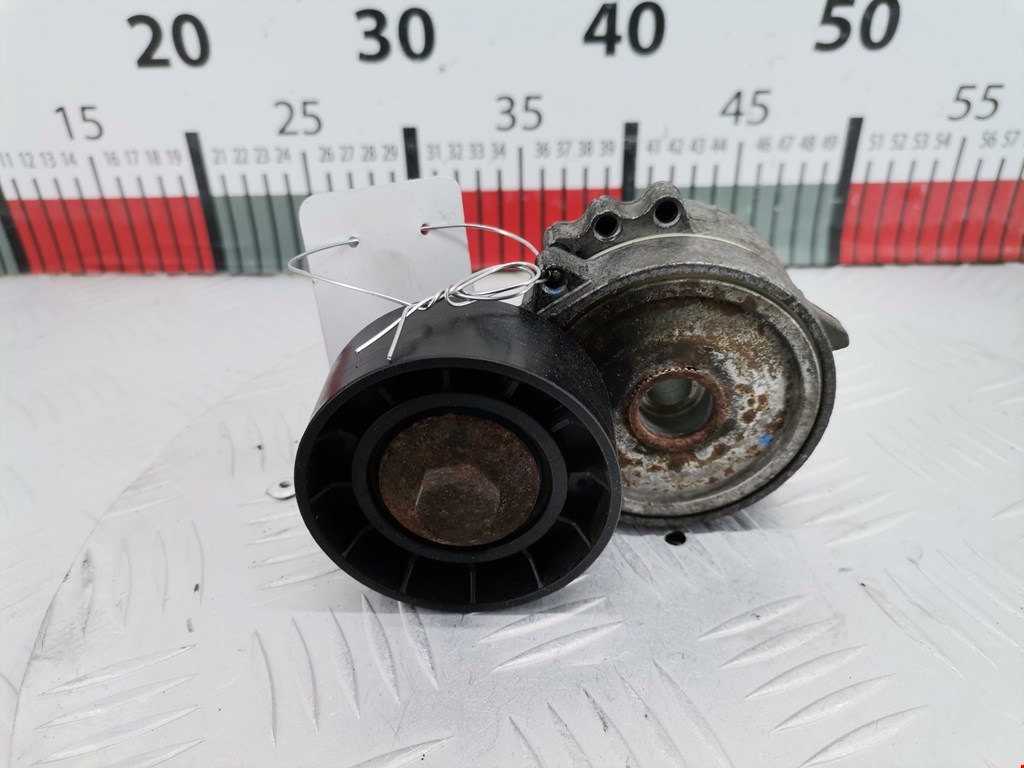 Натяжитель ремня генератора (приводного поликлинового ремня Ford Mondeo 4 (2006-2014)