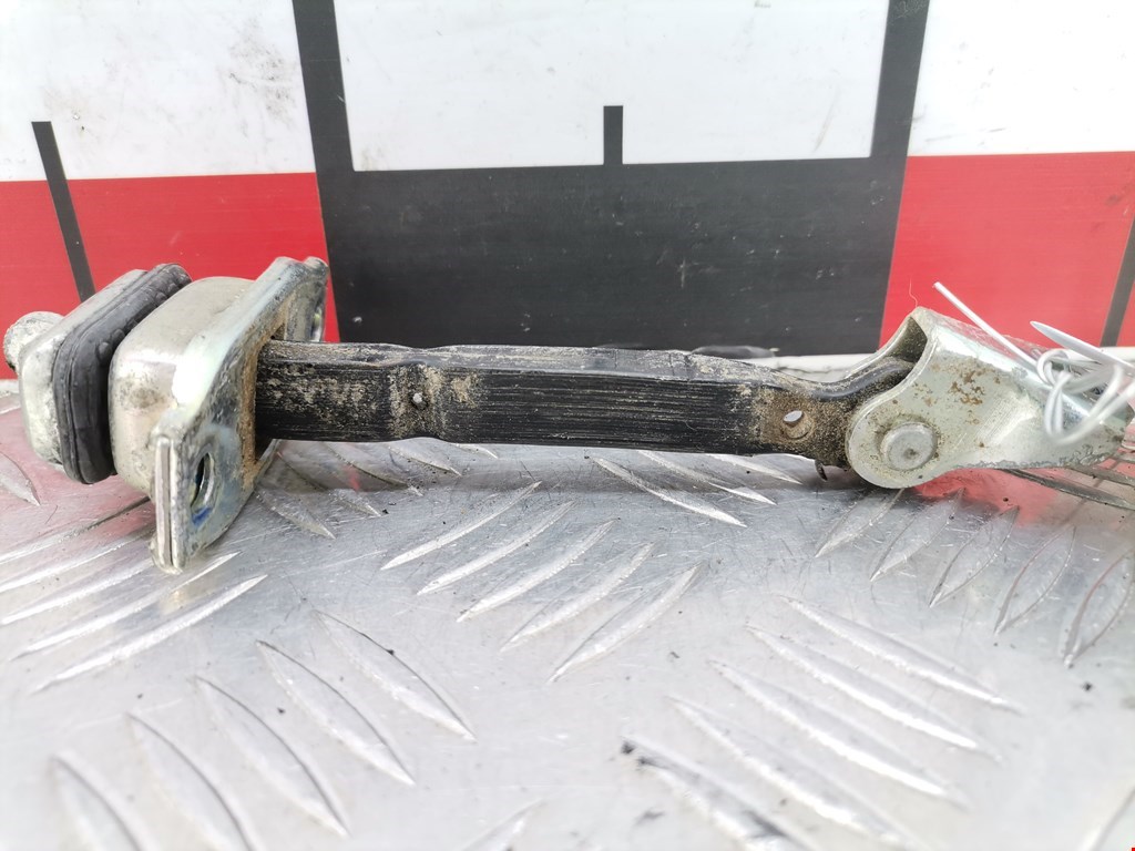 Ограничитель открывания двери MITSUBISHI L200 KB 2006-2015