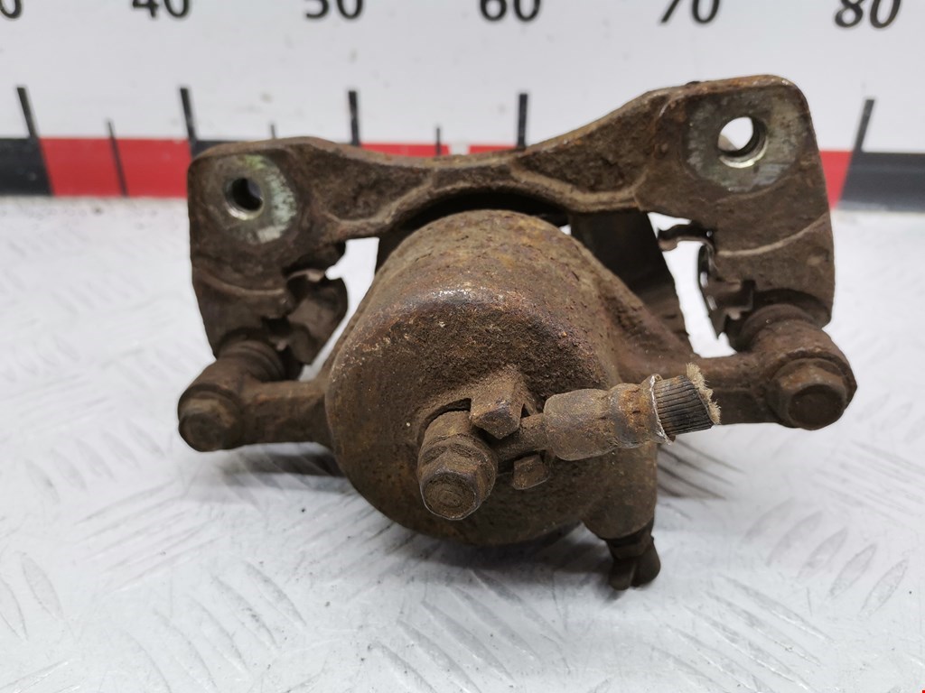 Суппорт передний левый DAEWOO Tacuma 2001-2011