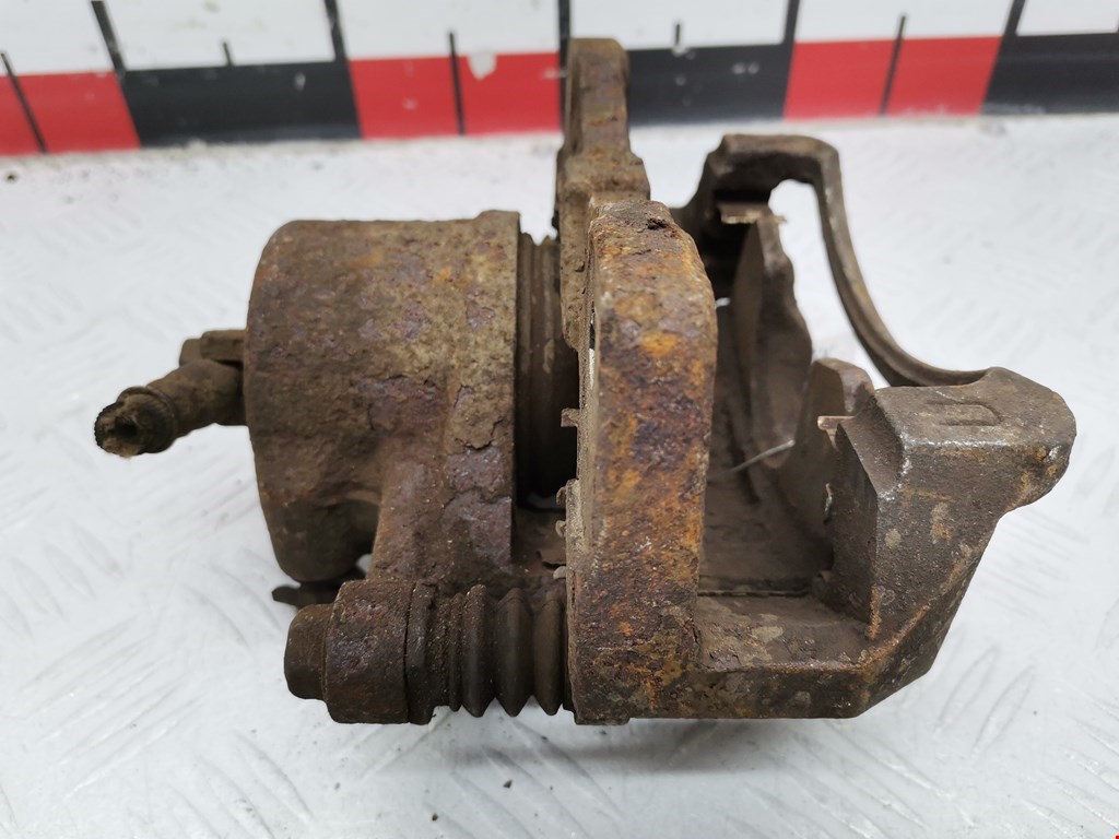 Суппорт передний левый DAEWOO Tacuma 2001-2011