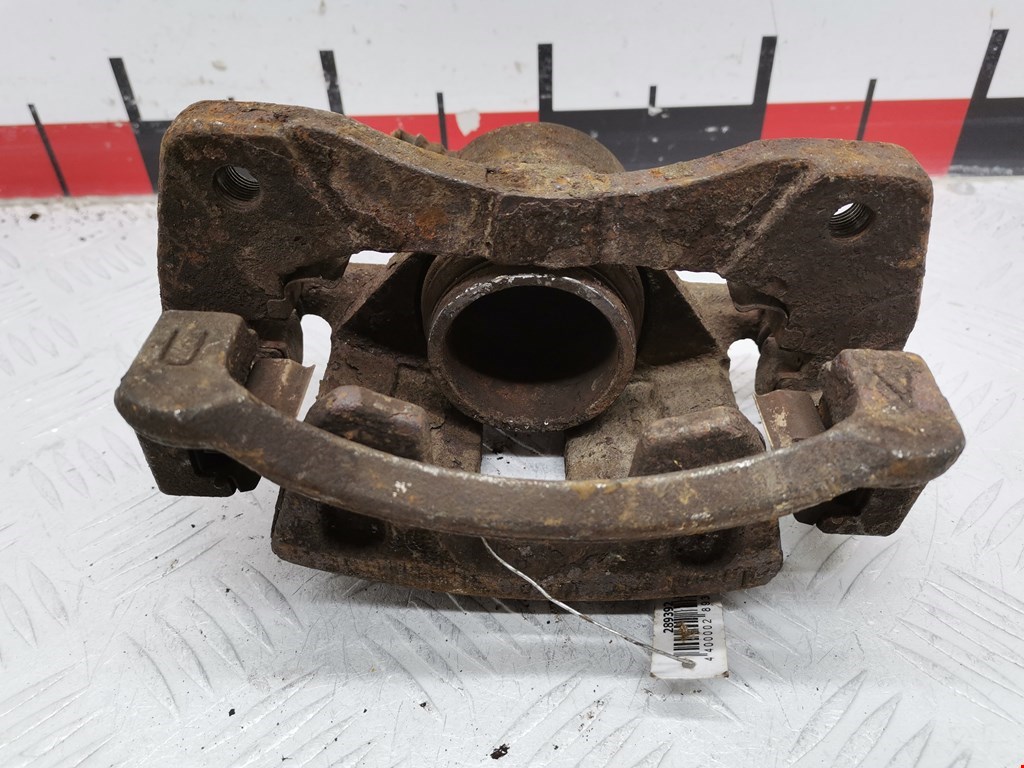 Суппорт передний левый DAEWOO Tacuma 2001-2011