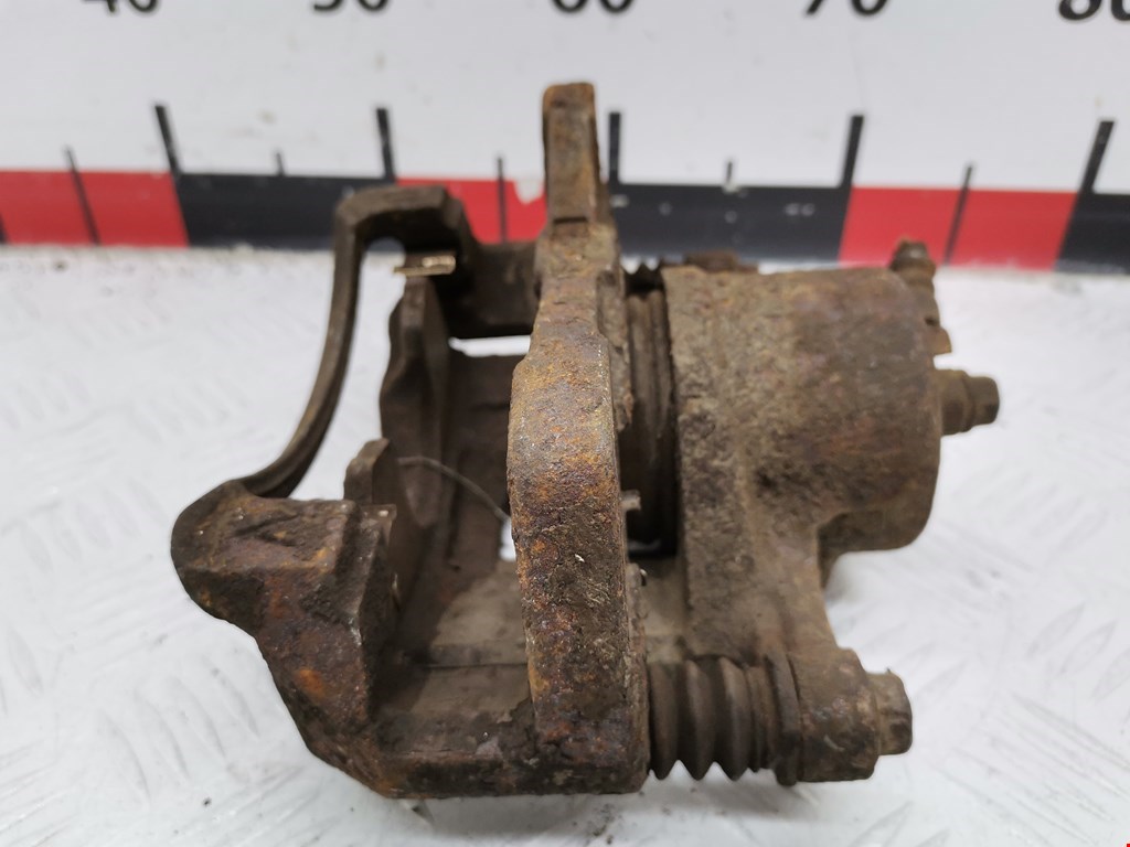 Суппорт передний левый DAEWOO Tacuma 2001-2011