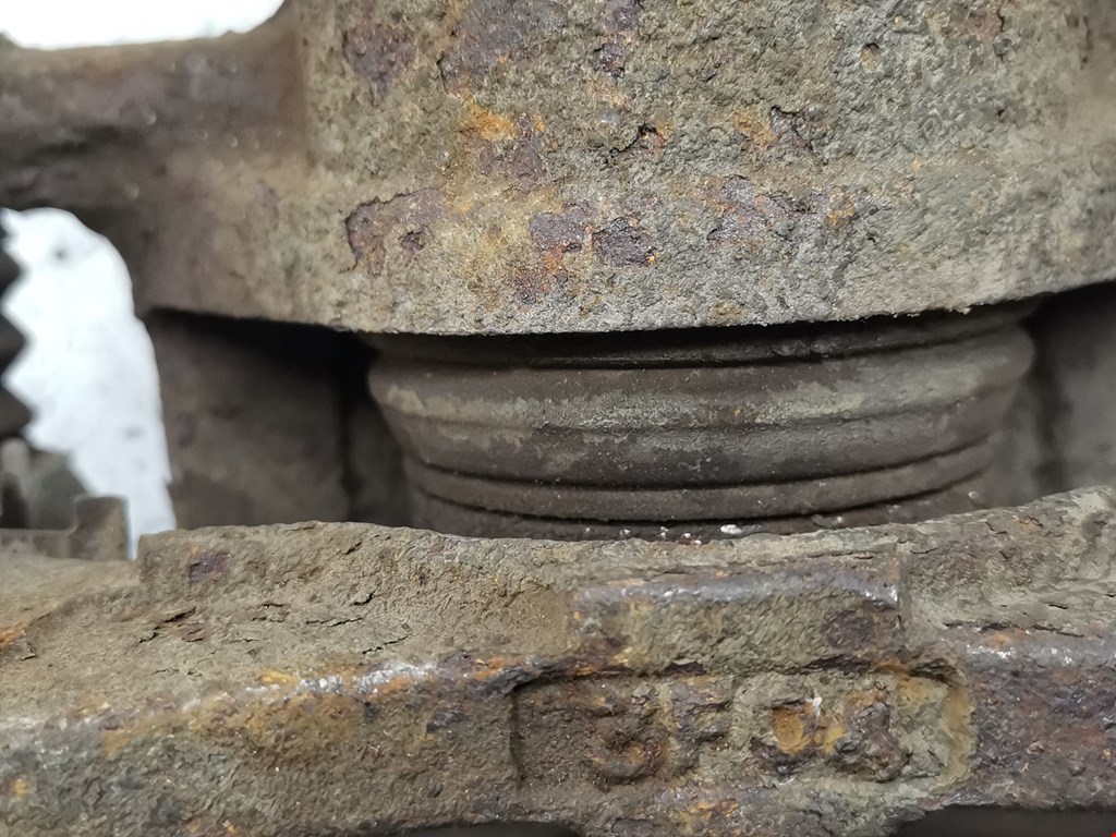 Суппорт передний левый DAEWOO Tacuma 2001-2011